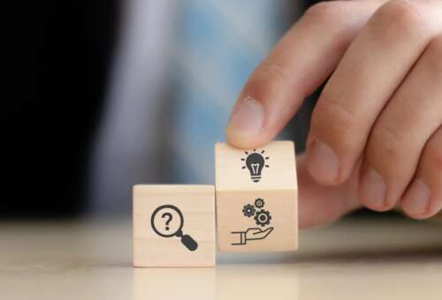 roller dice with investment symbols describing the purpose of the blog